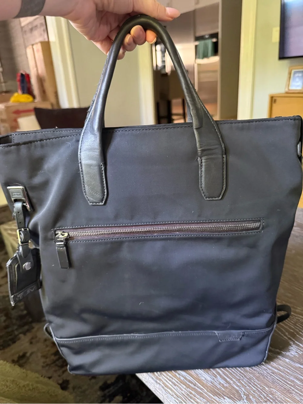 TUMI Backpack With Front Zip Pocket and laptop pocket inside